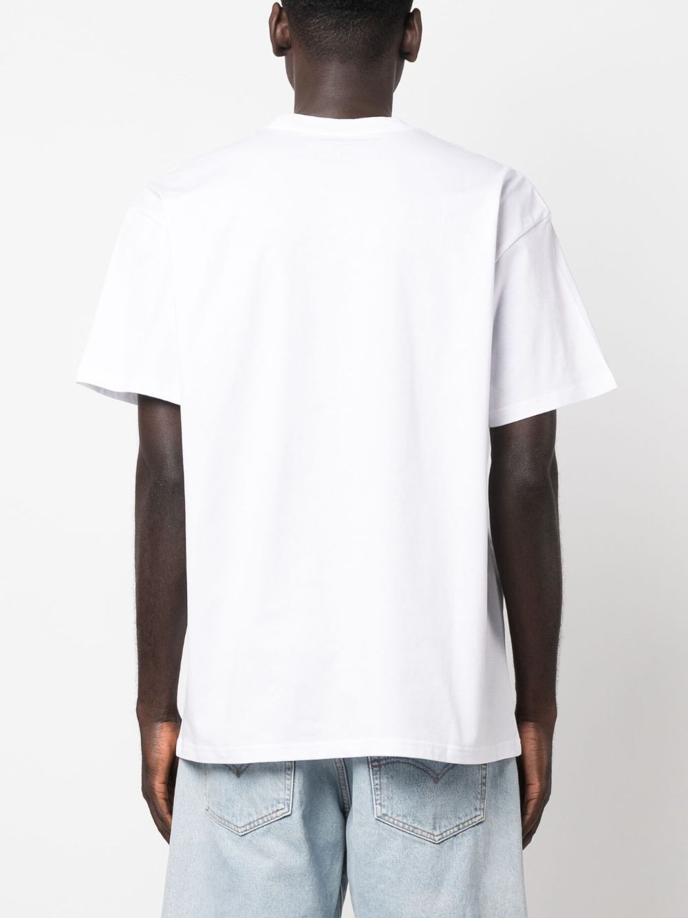 CARHARTT WIP T-shirt in cotone bianco con tasca e logo cuore