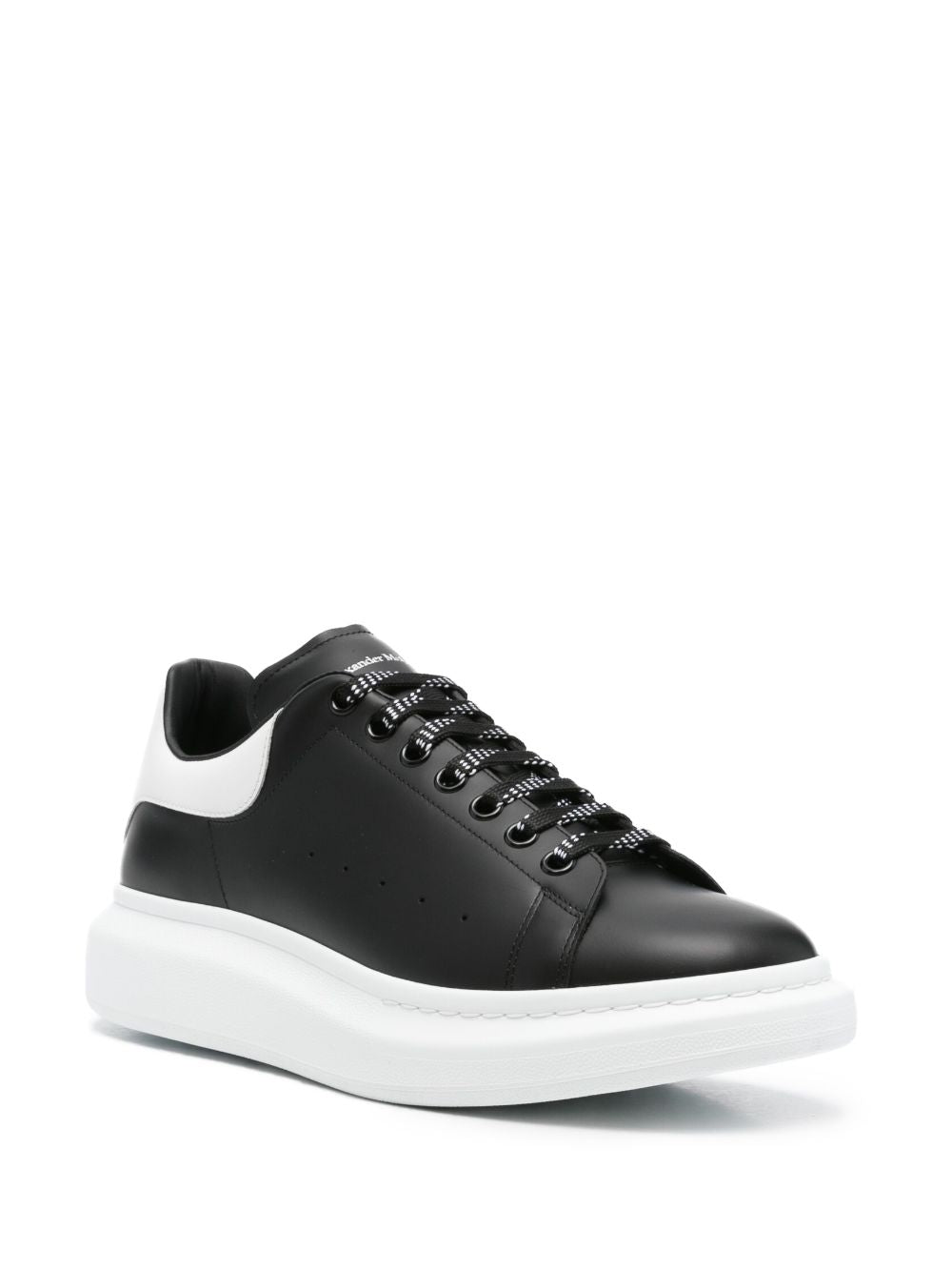 ALEXANDER McQUEEN Sneakers nere con suola e linguetta sul tallone bianca