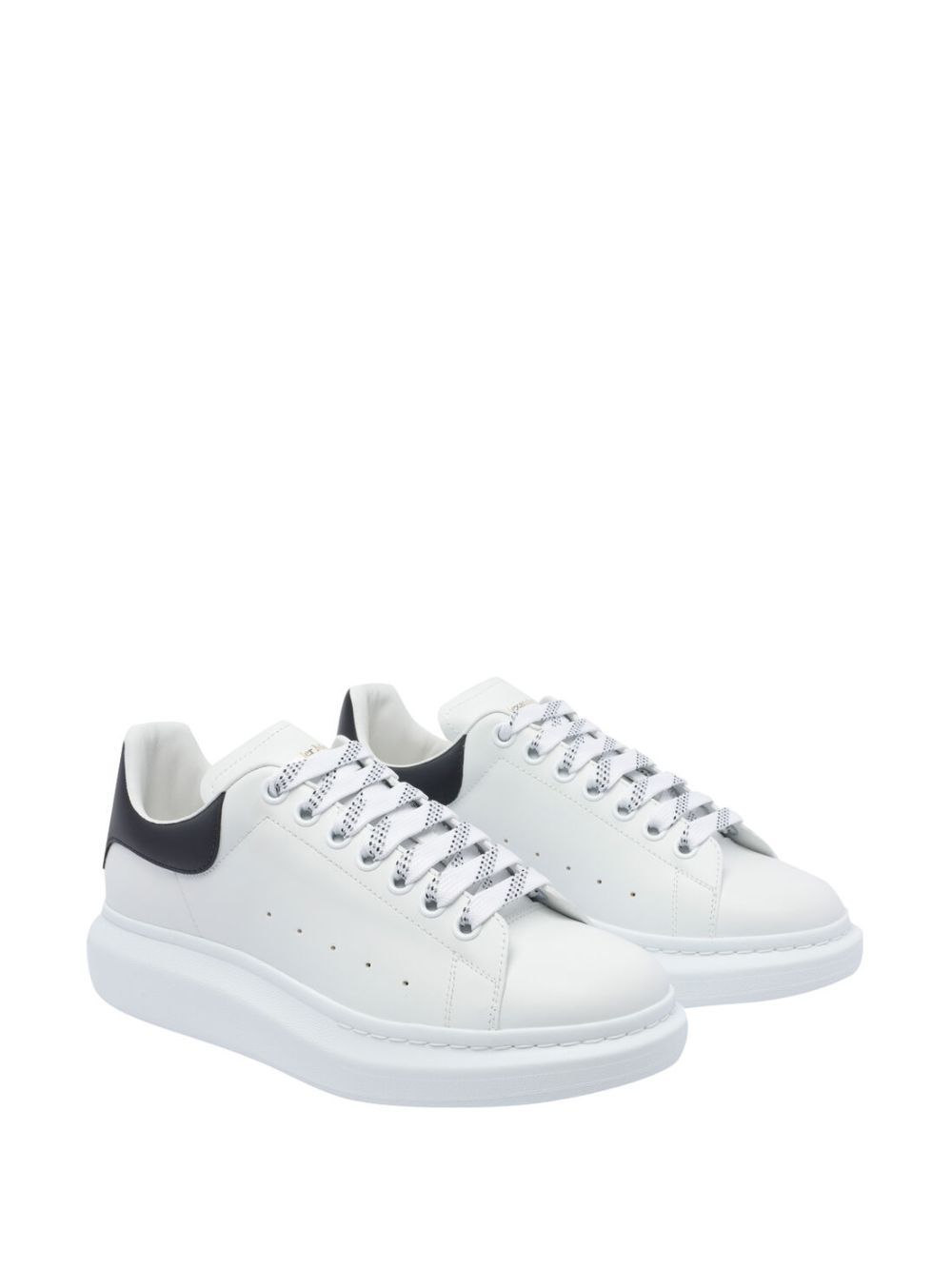 ALEXANDER McQUEEN Sneakers bianche con linguetta sul tallone nera