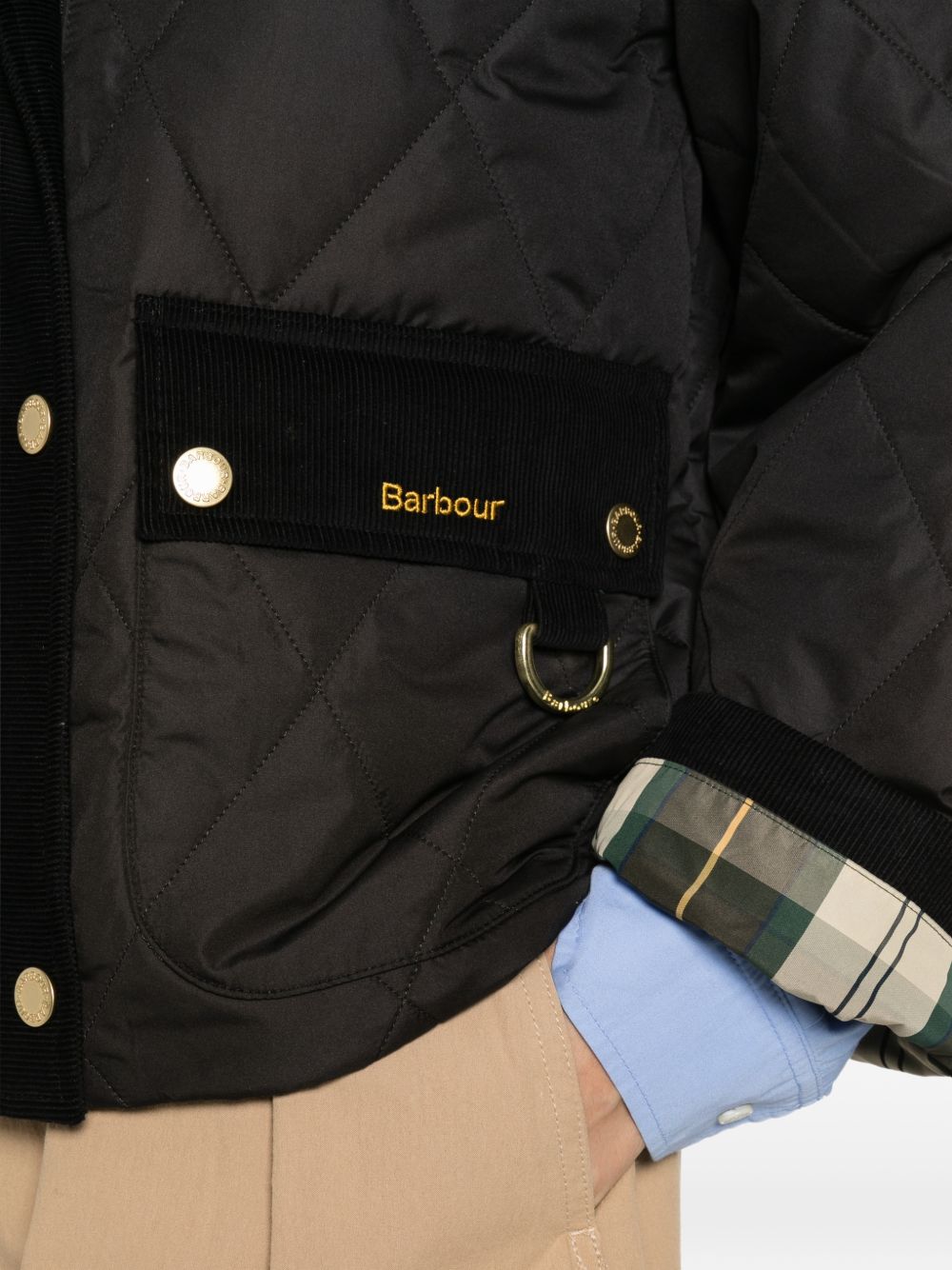 BARBOUR Giubbotto nero trapuntato con dettagli in velluto e tasche