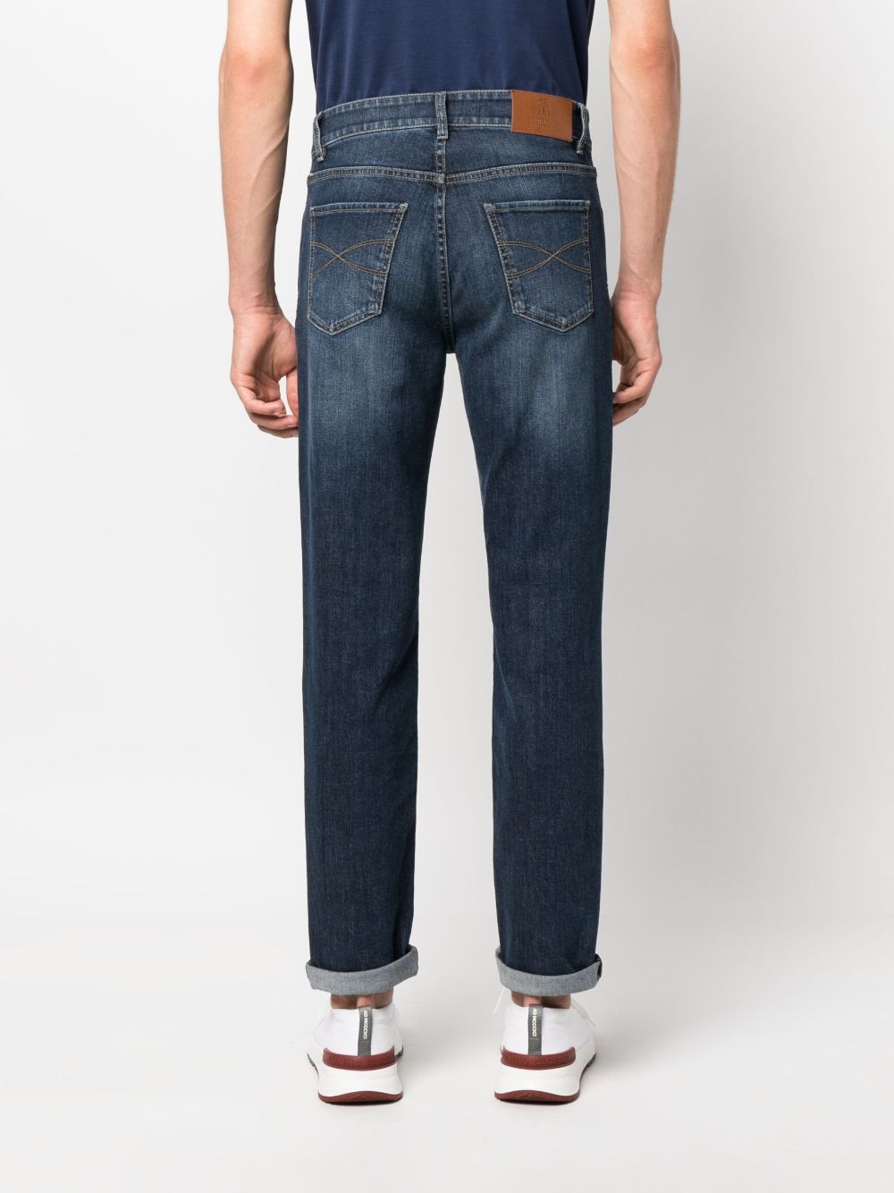 BRUNELLO CUCINELLI Jeans blu con risvolti alla caviglia ed effetto wash