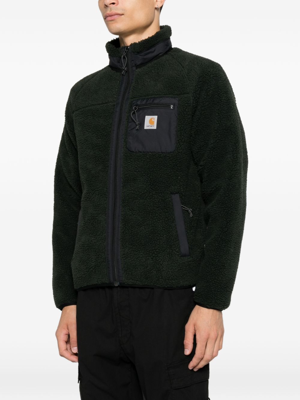 CARHARTT WIP Giacca in fur nero a collo alto con tasche e zip