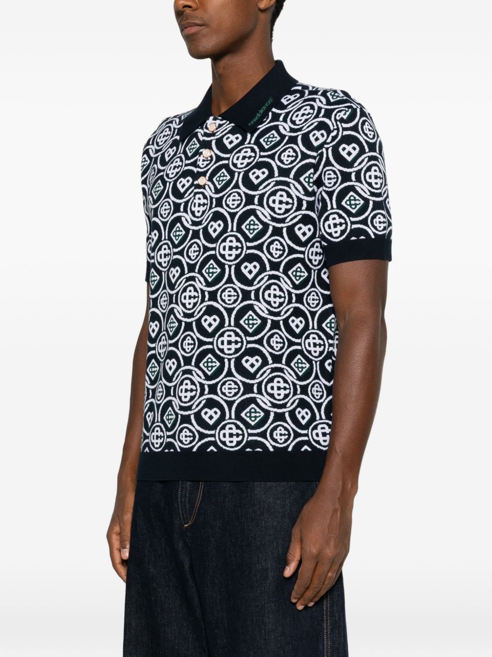 CASABLANCA Polo blu in cotone a maniche corte con logo all-over