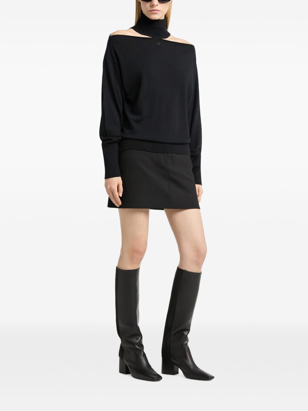 COURREGES Maglia in lana merino nera a collo alto con dettagli cut-out