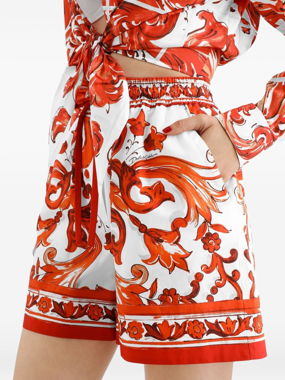 DOLCE e GABBANA Shorts in cotone arancione con stampa grafica