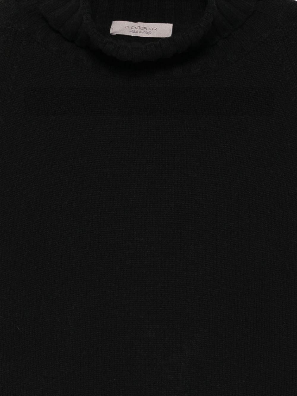 D EXTERIOR Maglia nera a collo alto con dettagli cut-out intrecciati sulle maniche