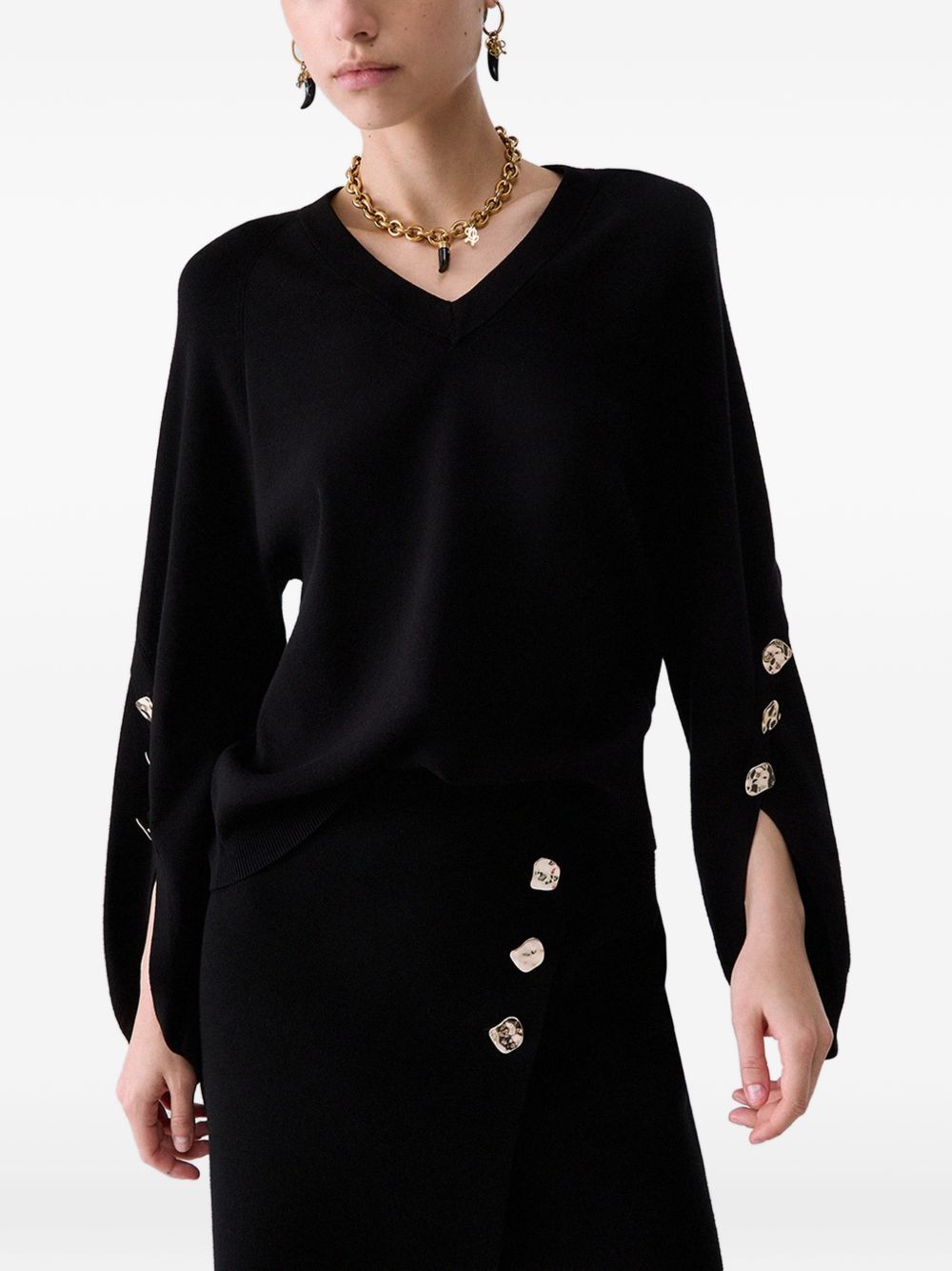 LIUJO Maglia nera con scollo a V e maniche a palloncino