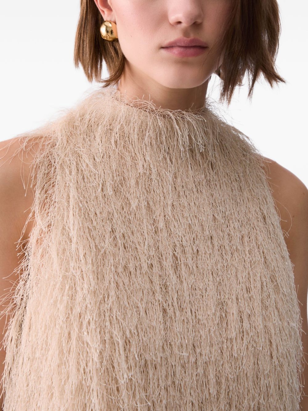 LIUJO Top smanicato color crema con frange