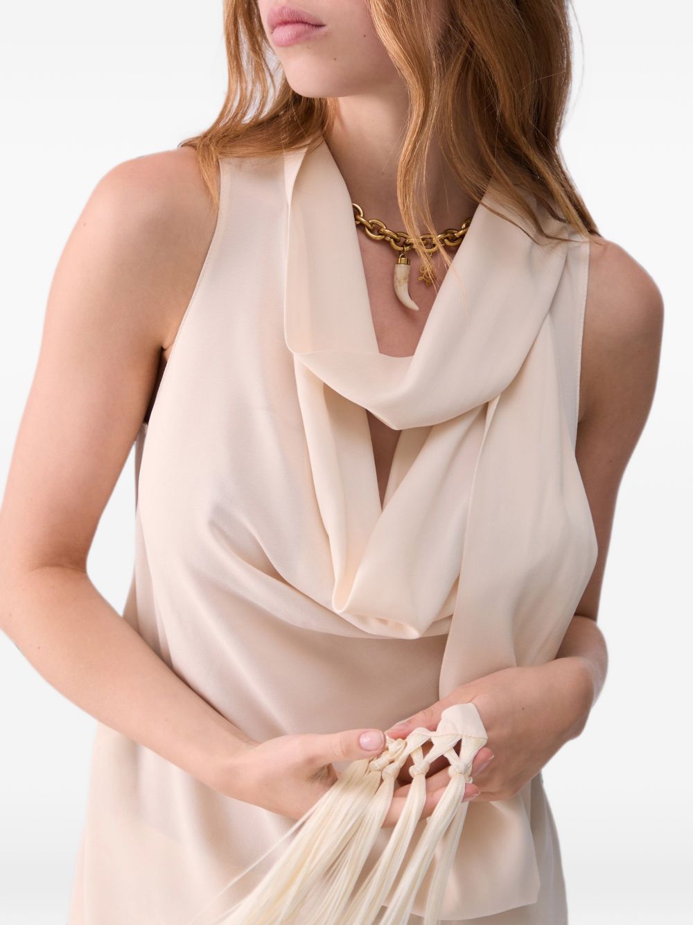 LIUJO Top color crema senza maniche con collo lavallière e frange