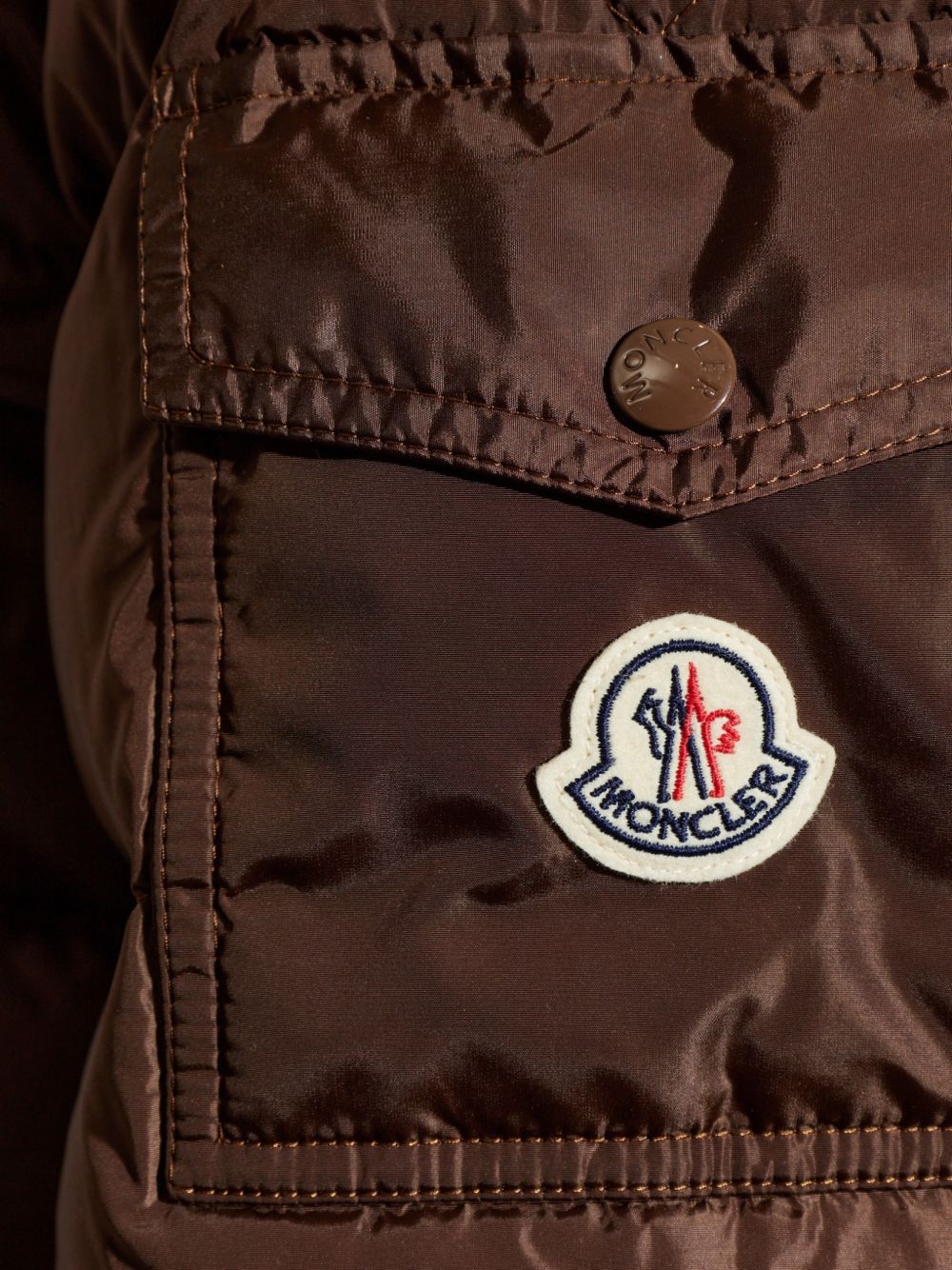 MONCLER Piumino Maya marrone trapuntato con cappuccio e tasche interne