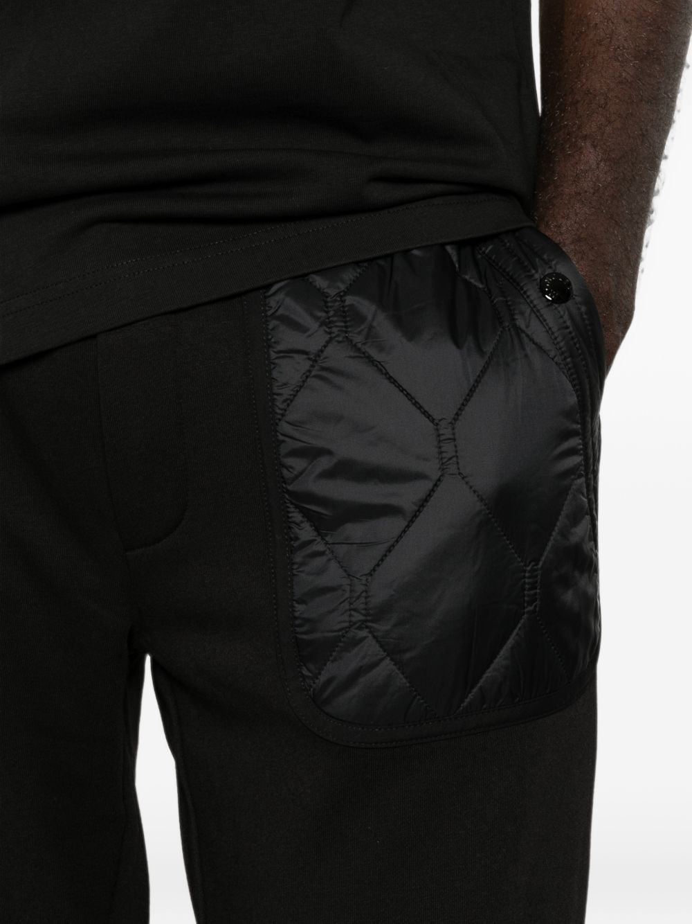 MONCLER Pantaloni sportivi neri da uomo con tasche trapuntate