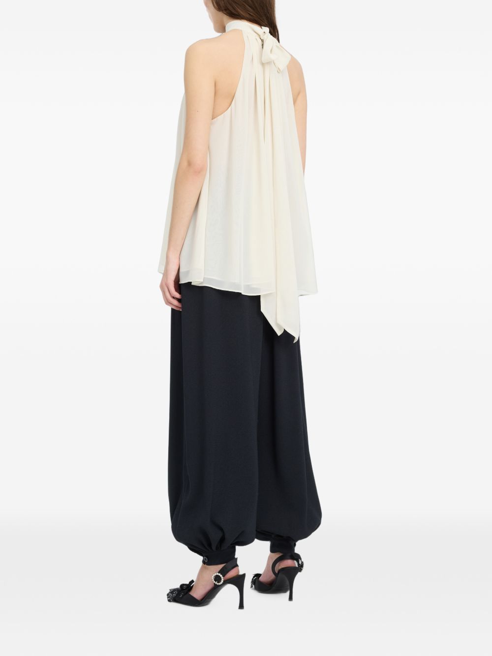 ROTATE Top panna con scollo halter e dettaglio cut-out