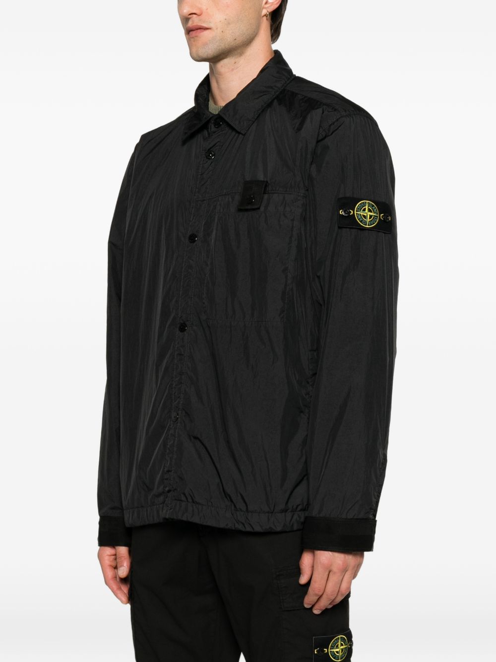 STONE ISLAND Giacca a vento nera con patch logo