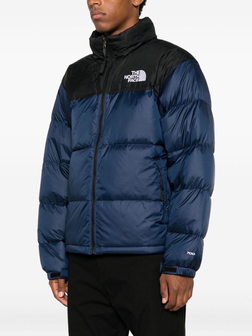 THE NORTH FACE Piumino corto con zip blu e nero con logo