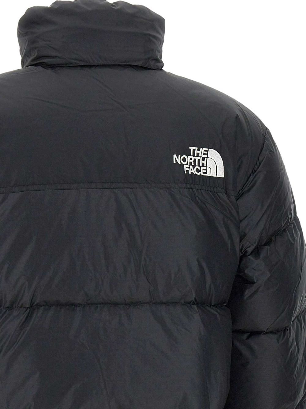 THE NORTH FACE Piumino corto con zip nero con logo