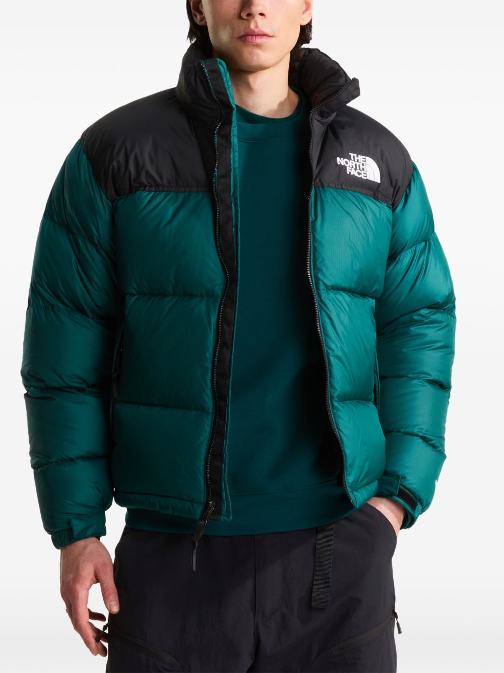 THE NORTH FACE Piumino corto con zip nero e verde con logo