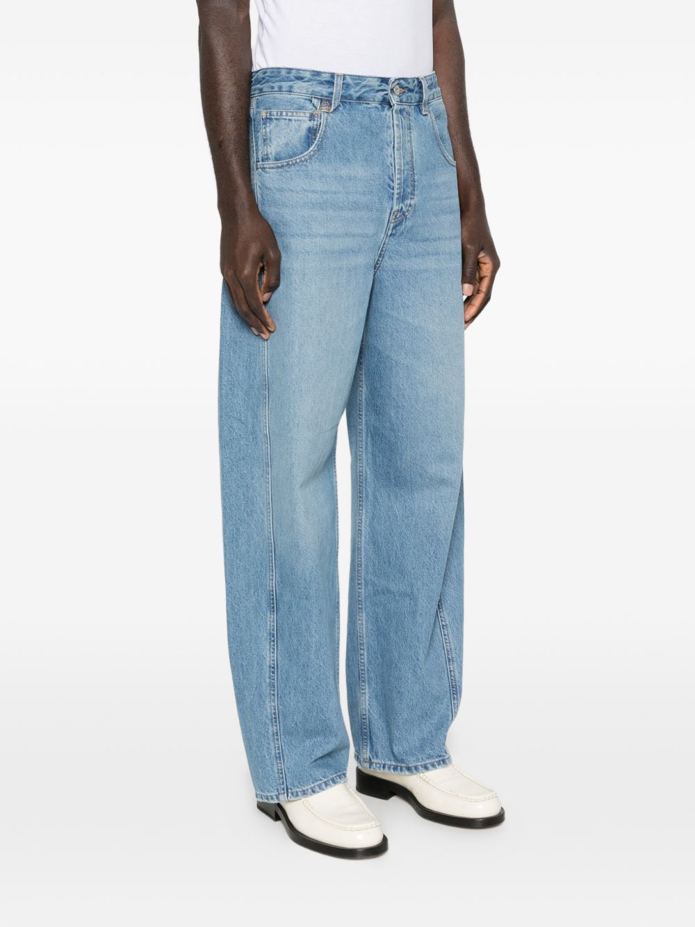 JACQUEMUS Jeans a gamba larga con tasche