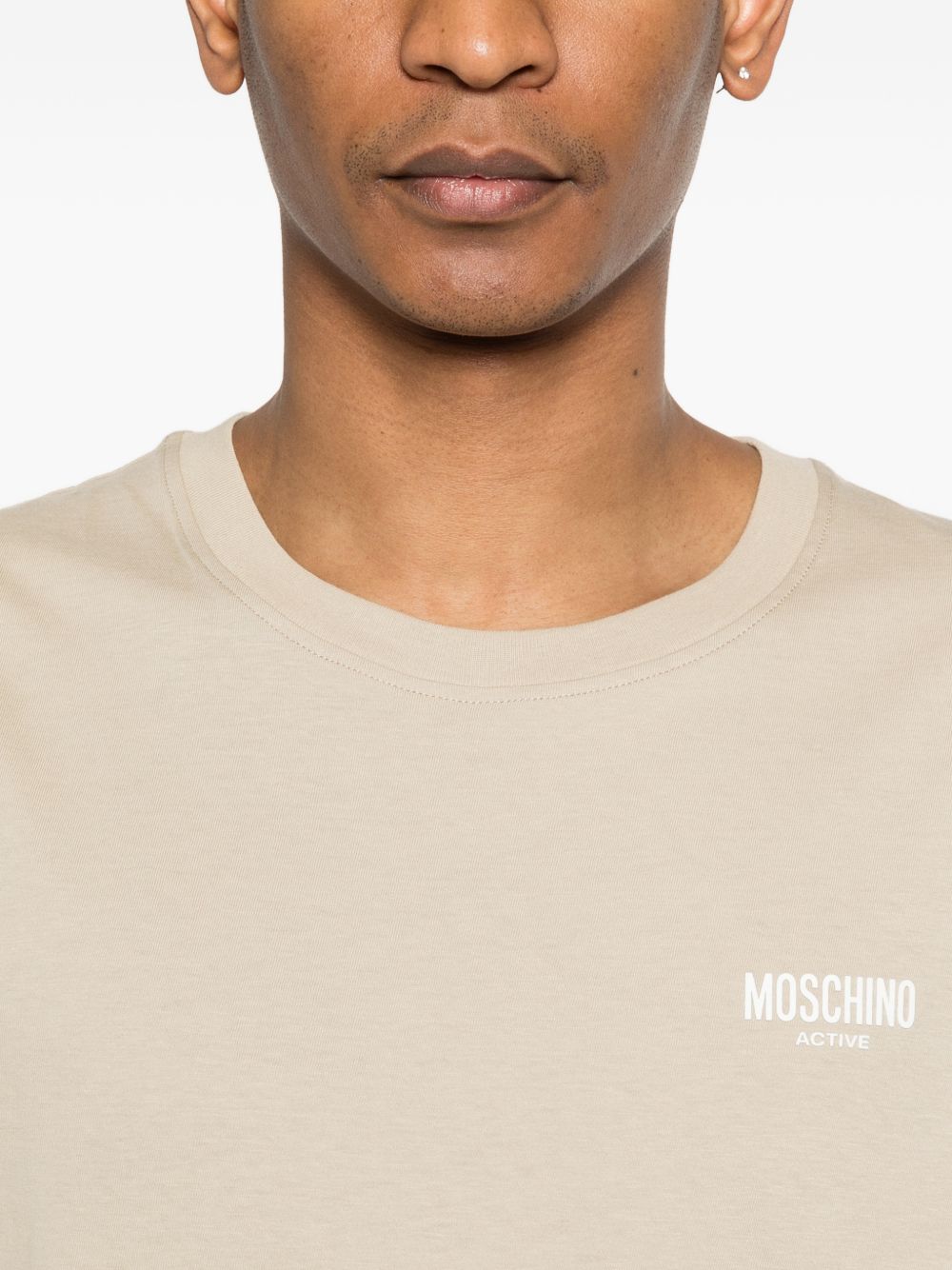 MOSCHINO UNDERWEAR T-shirt beige con logo e design grafico