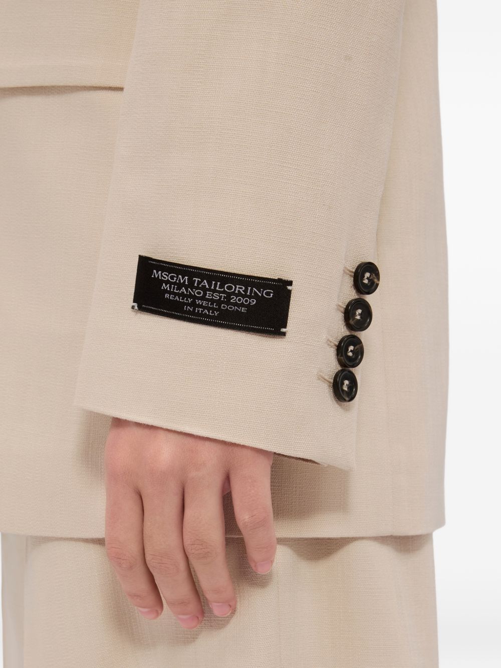 MSGM Blazer doppiopetto in beige con revers a lancia