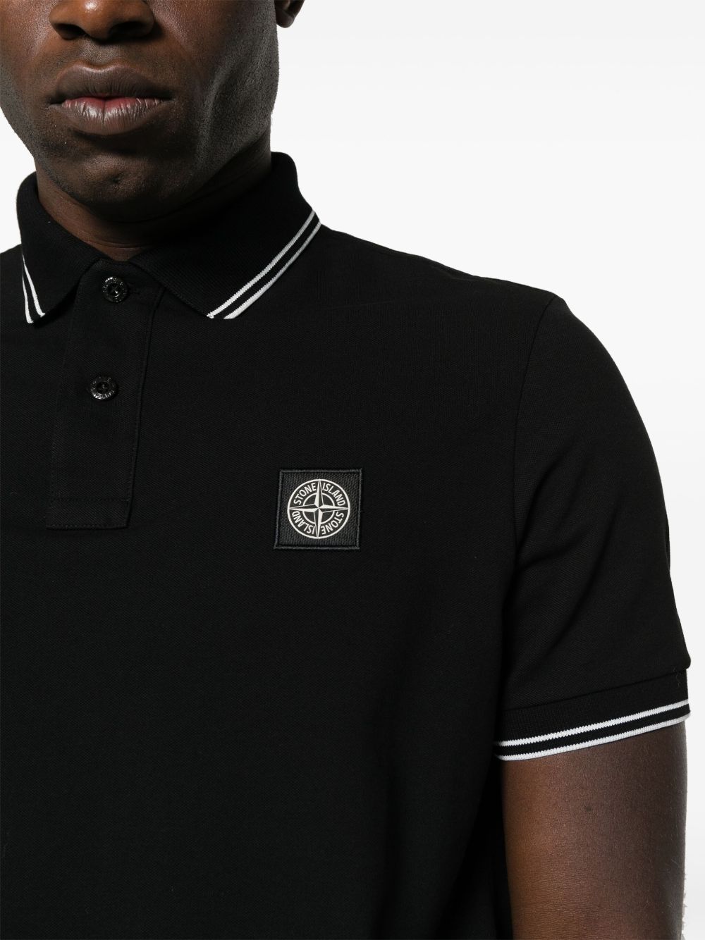 STONE ISLAND Polo in cotone nero con logo