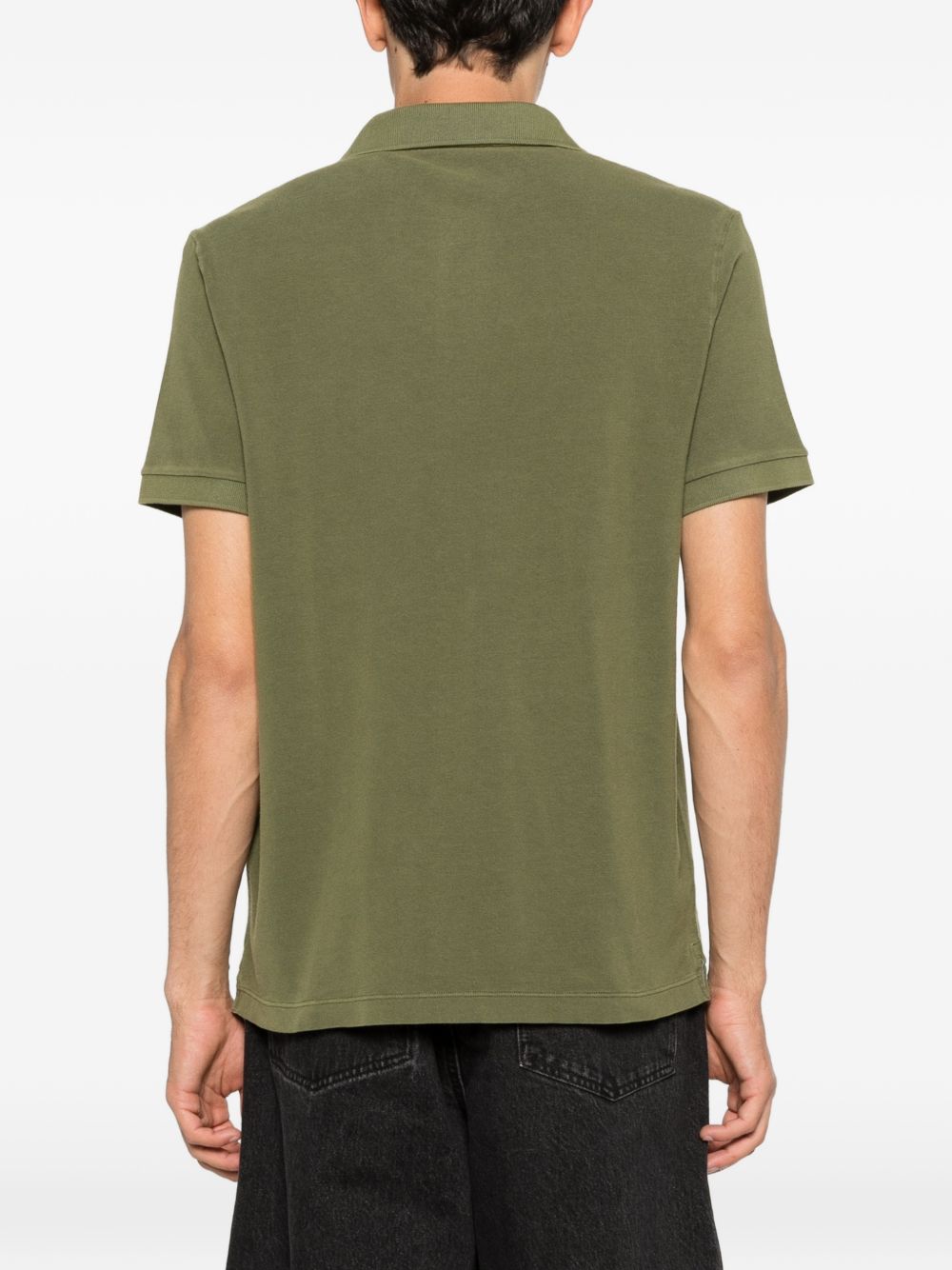 STONE ISLAND Polo in cotone verde con logo e maniche corte