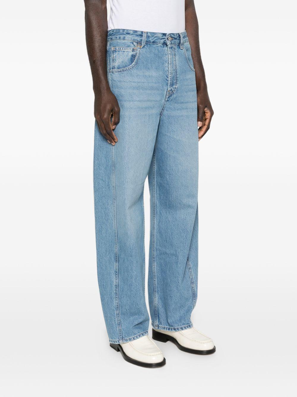 JACQUEMUS Jeans a gamba larga con tasche
