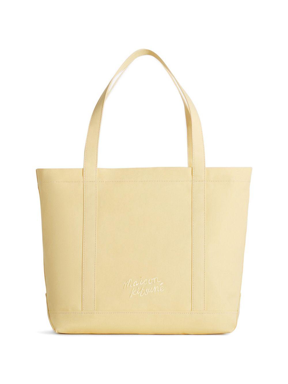 MAISON KITSUNE Borsa a mano con icona design ricamato giallo burro