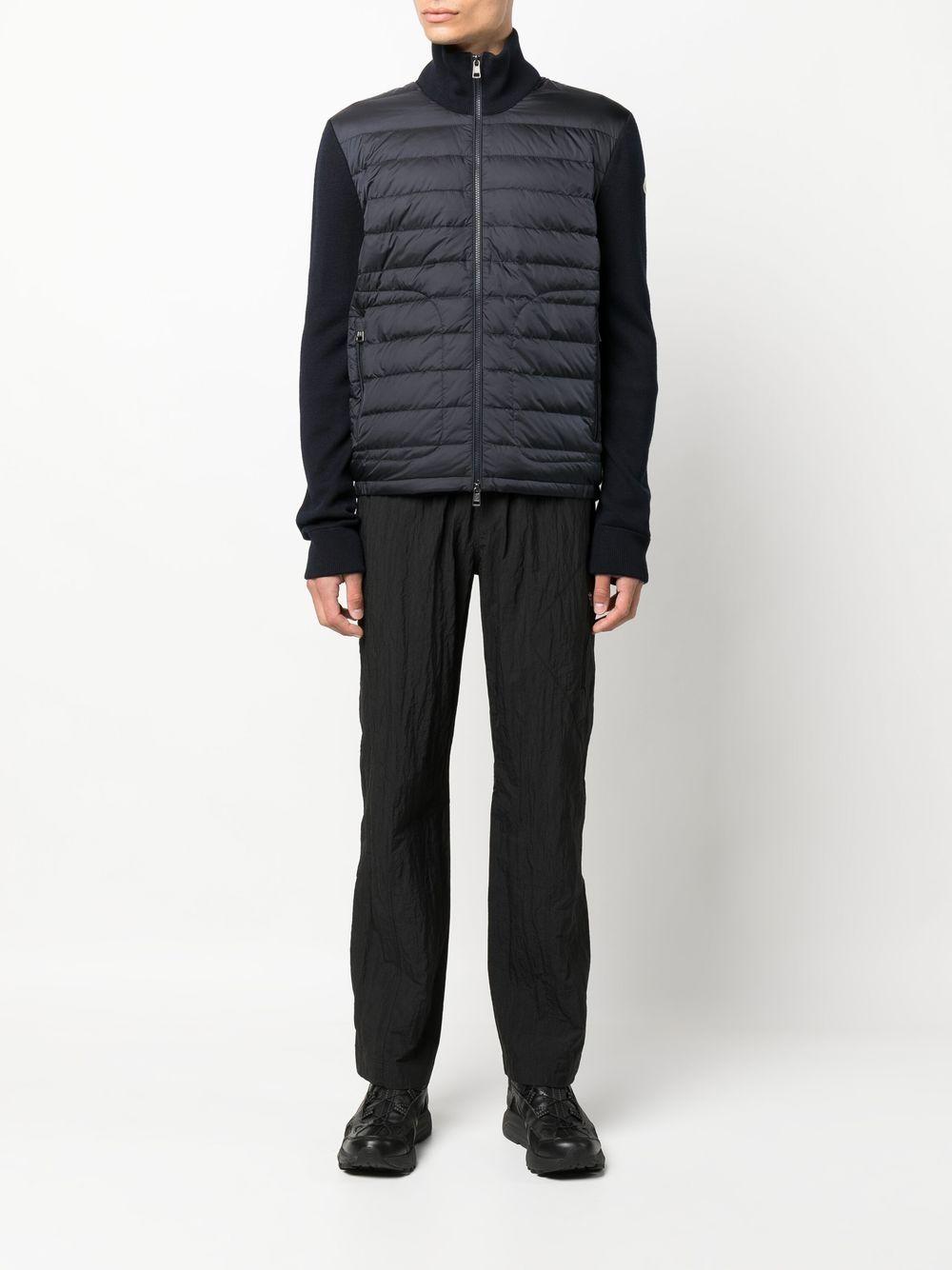 MONCLER Piumino blu navy con maniche di lana