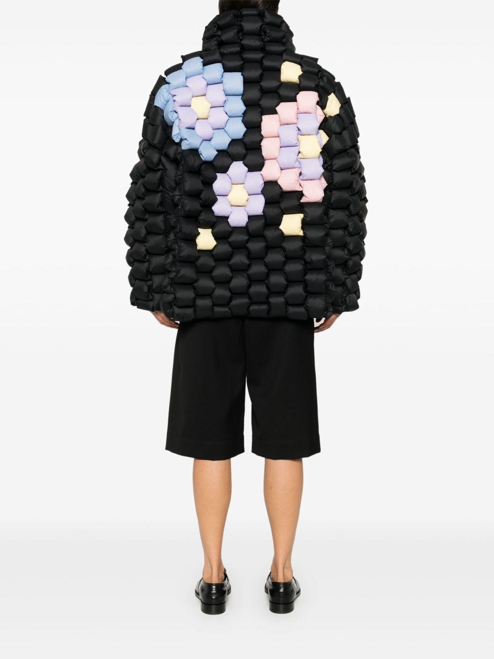 RAXXY Piumino nero con design imbottito a intreccio 3D