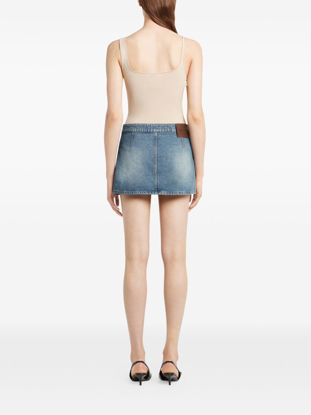 COURREGES Minigonna in denim di cotone con tasche
