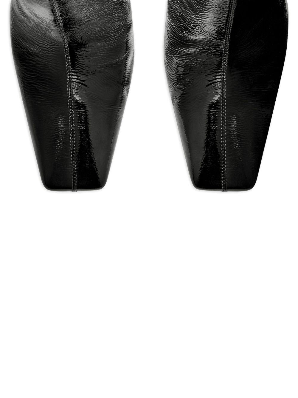 COURREGES Stivale in pelle con tacco nero