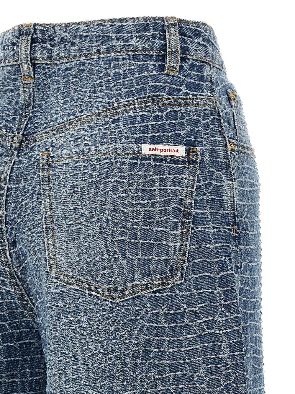 SELF PORTRAIT Jeans wide-leg con effetto cocco