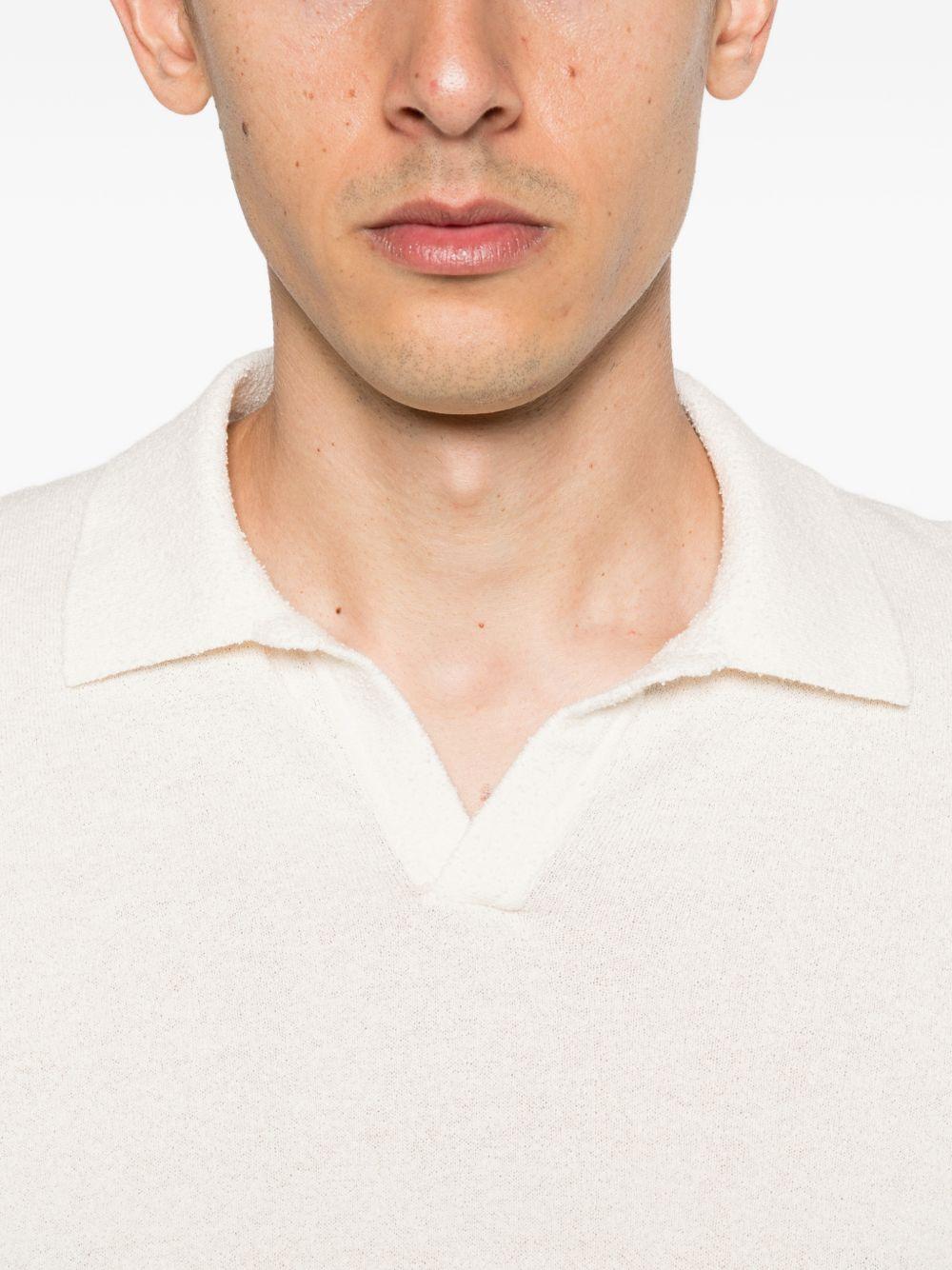 SCAGLIONE Polo in cotone bianco a maniche corte