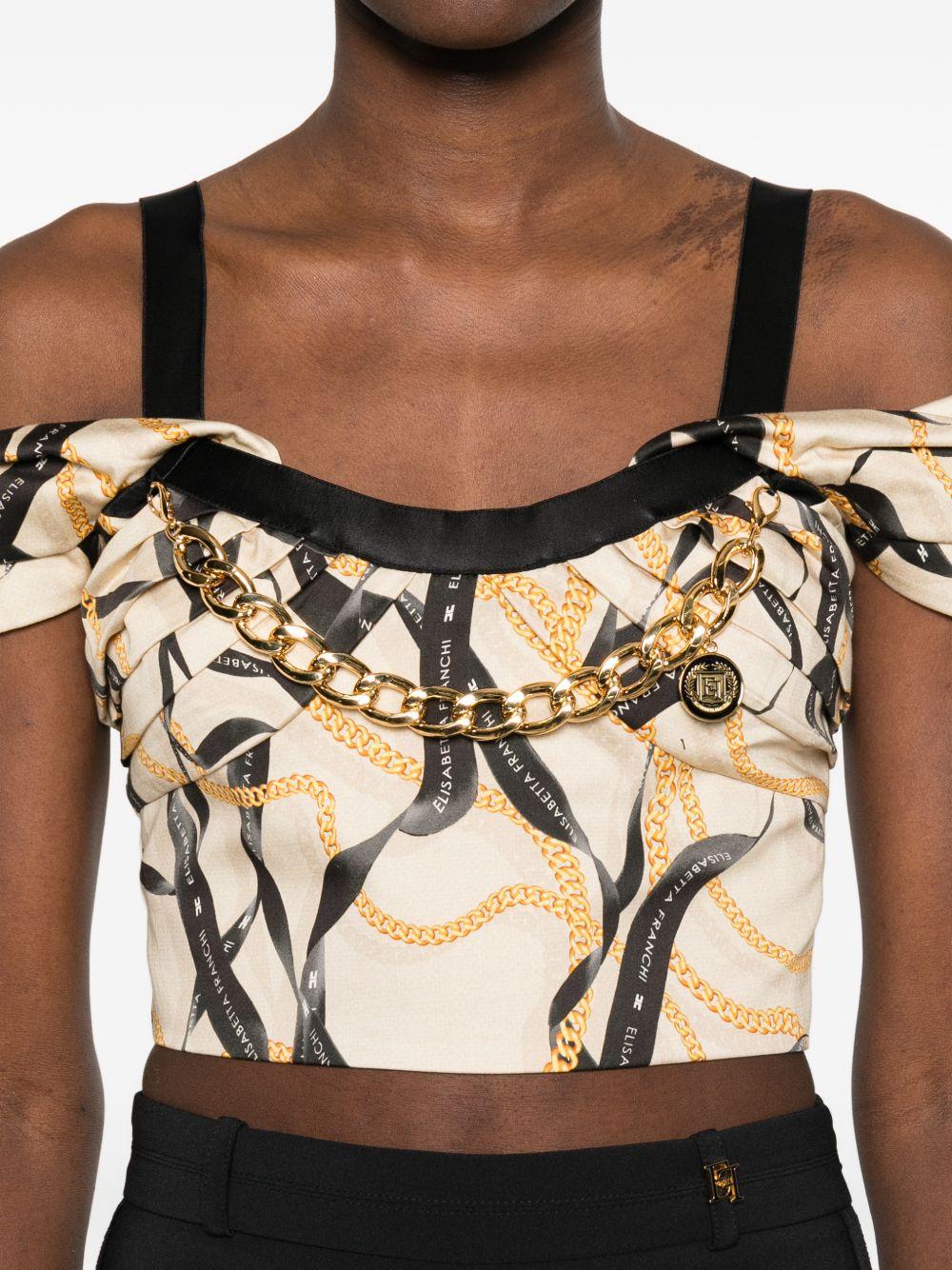 ELISABETTA FRANCHI Top con stampa grafica beige e nero con detagglio a catena