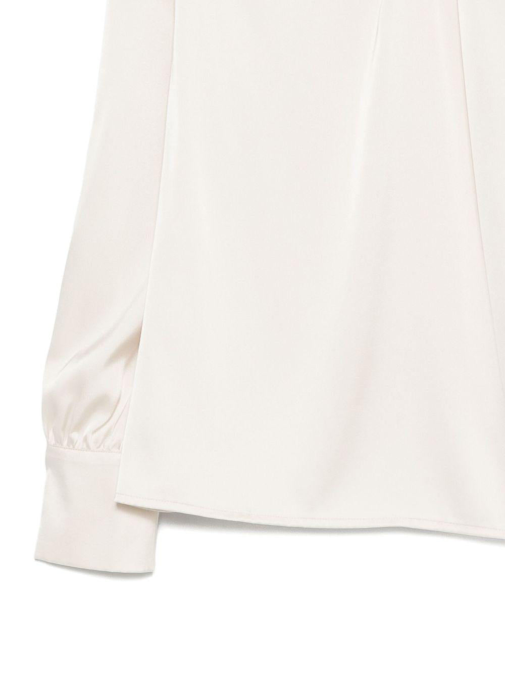 D EXTERIOR Blusa bianca a collo alto