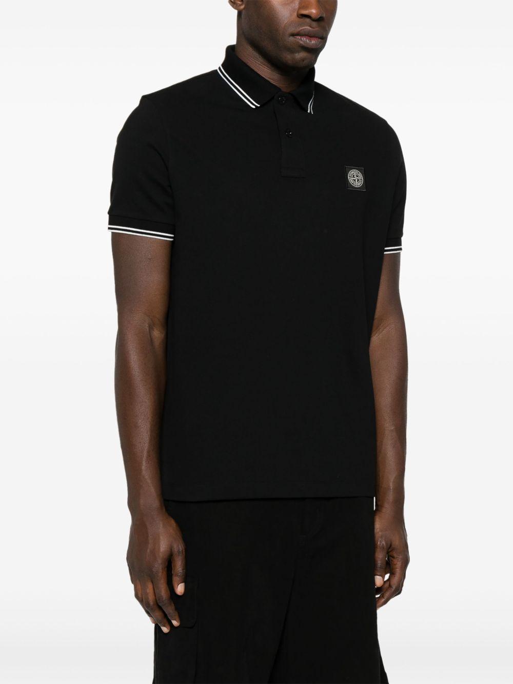 STONE ISLAND Polo in cotone nero con logo