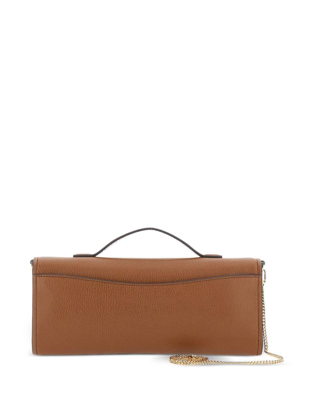 MICHAEL KORS Clutch 'Hamilton Moderne' con pendente a lucchetto