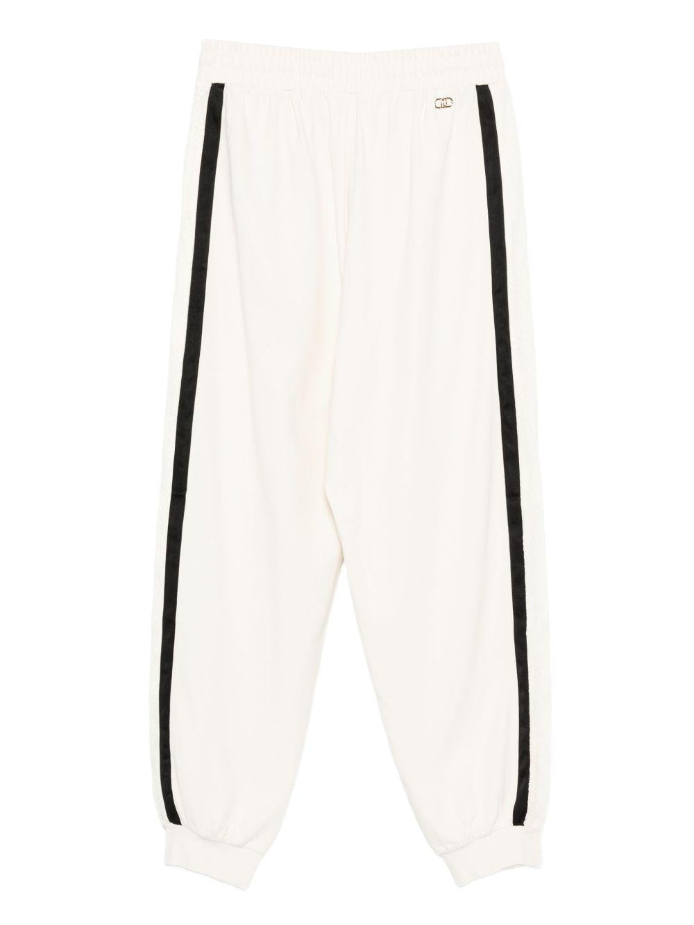 LIUJO Pantaloni sportivi bianchi con righe nere