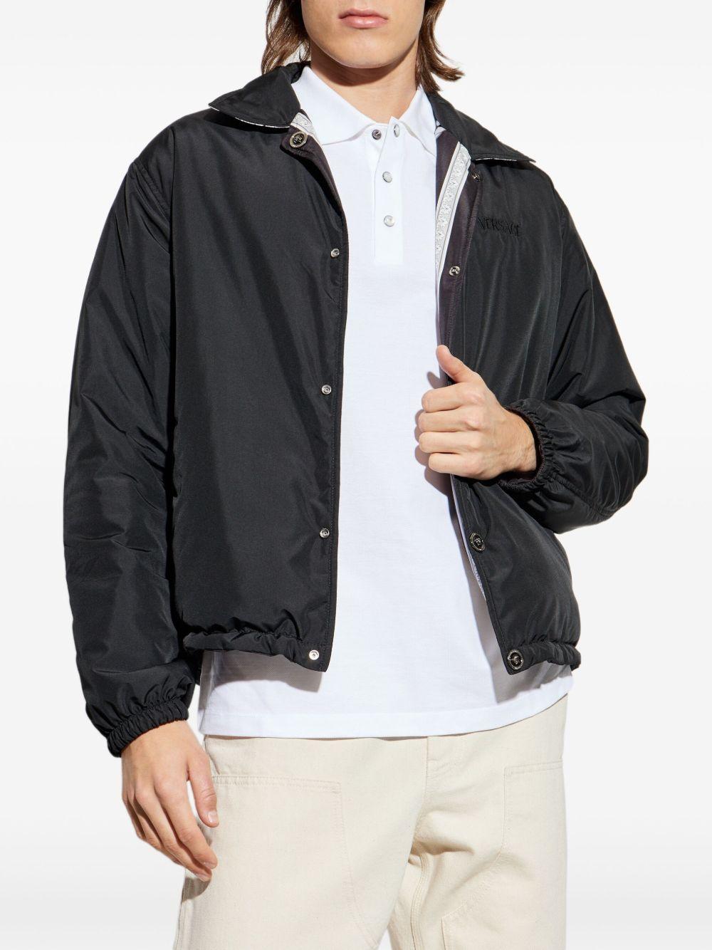 VERSACE Giacca nera reversibile con stampa Barocco