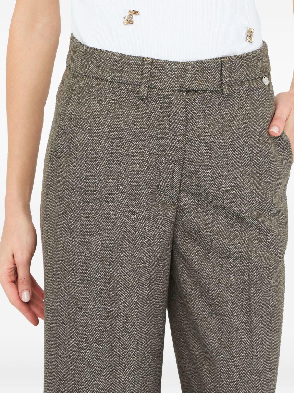 LIUJO Pantaloni con motivo chevron e piega stirata