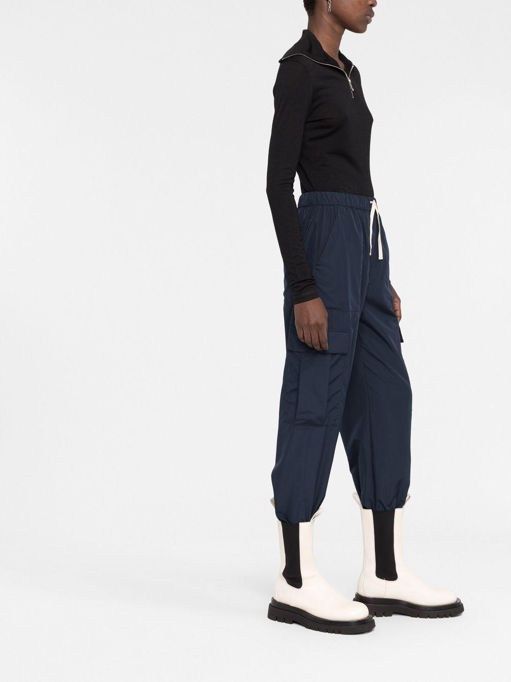 JIL SANDER Top a maniche lunghe con zip