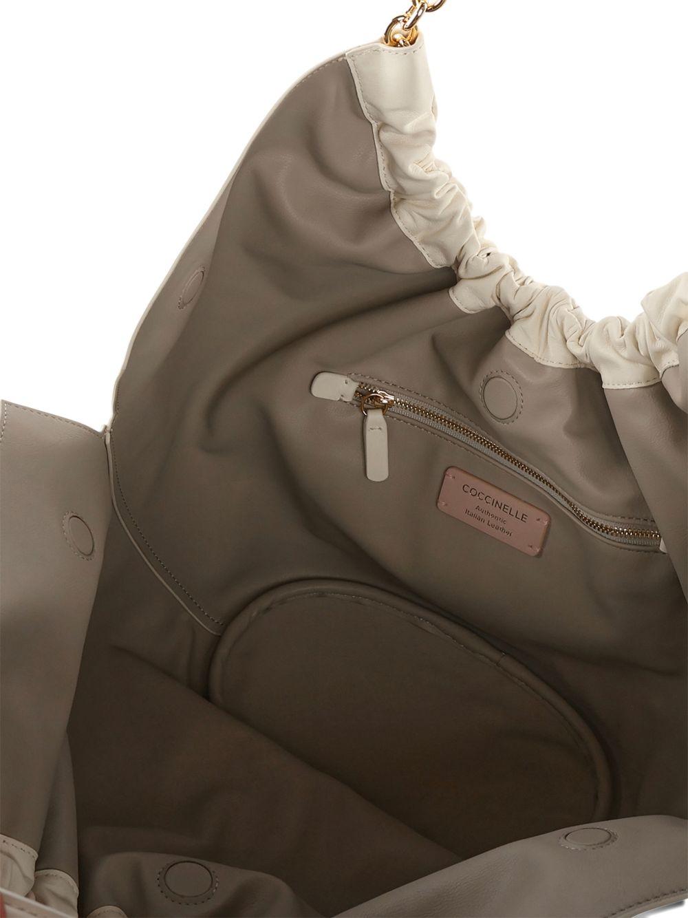 COCCINELLE Borsa a spalla color panna in tessuto morbito satinato lucido