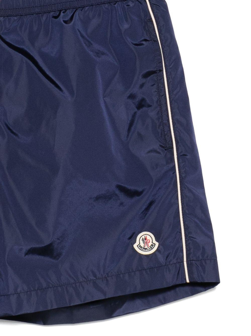 MONCLER Costume blu con logo
