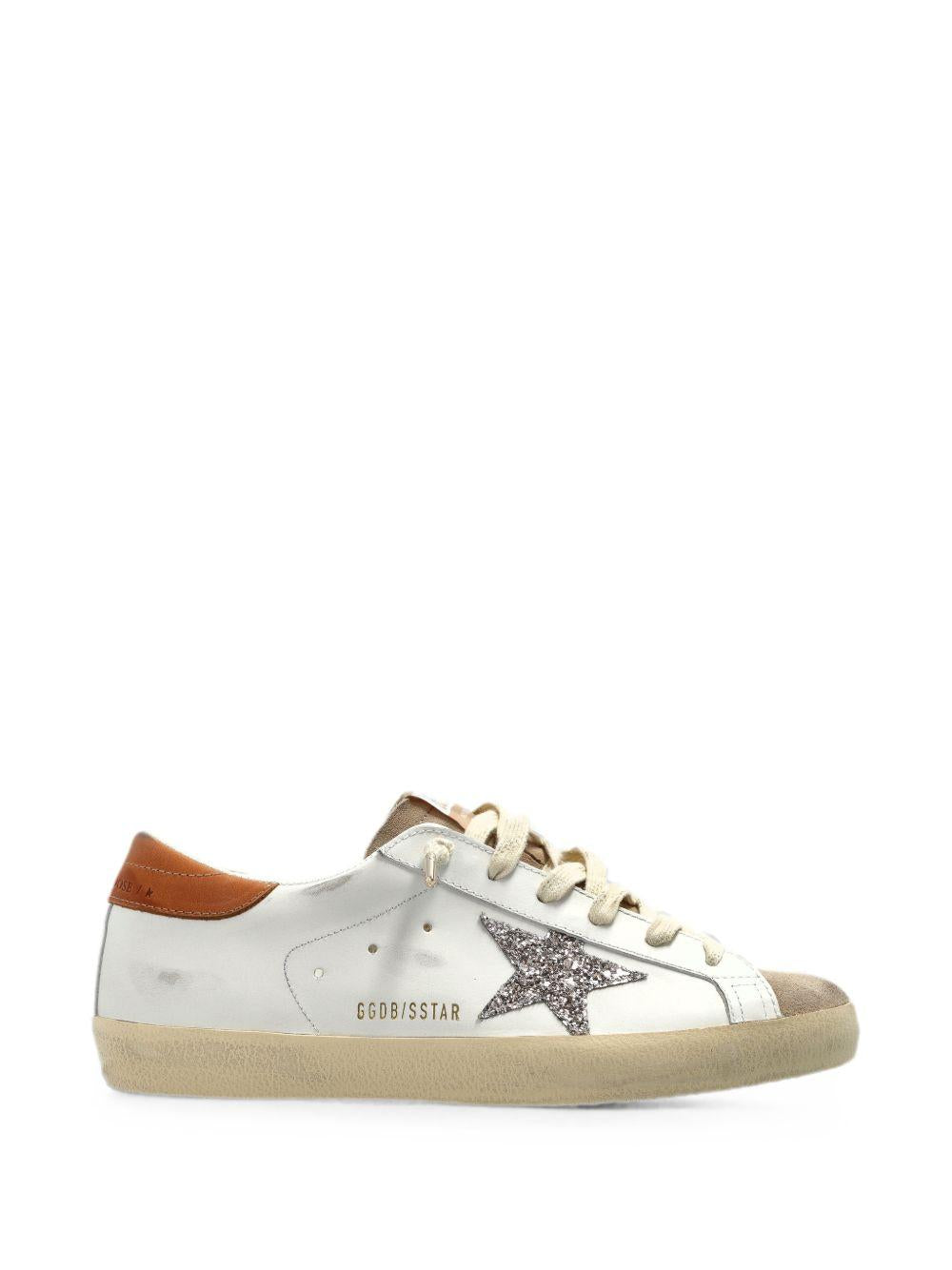 GOLDEN GOOSE Sneakers Super-Star in pelle bianca con stella glitter