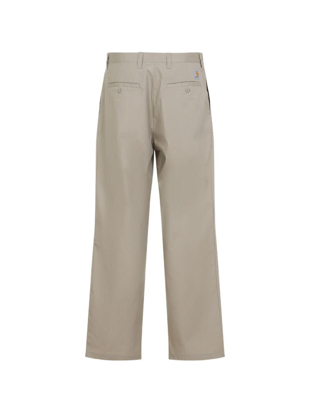 CARHARTT WIP Pantaloni svasati in cotone beige con logo