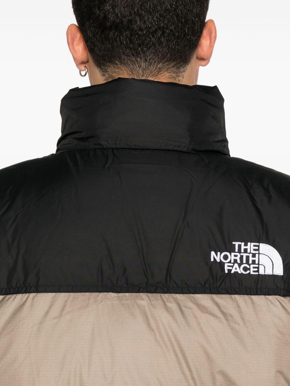 THE NORTH FACE Piumino corto beige e nero con logo