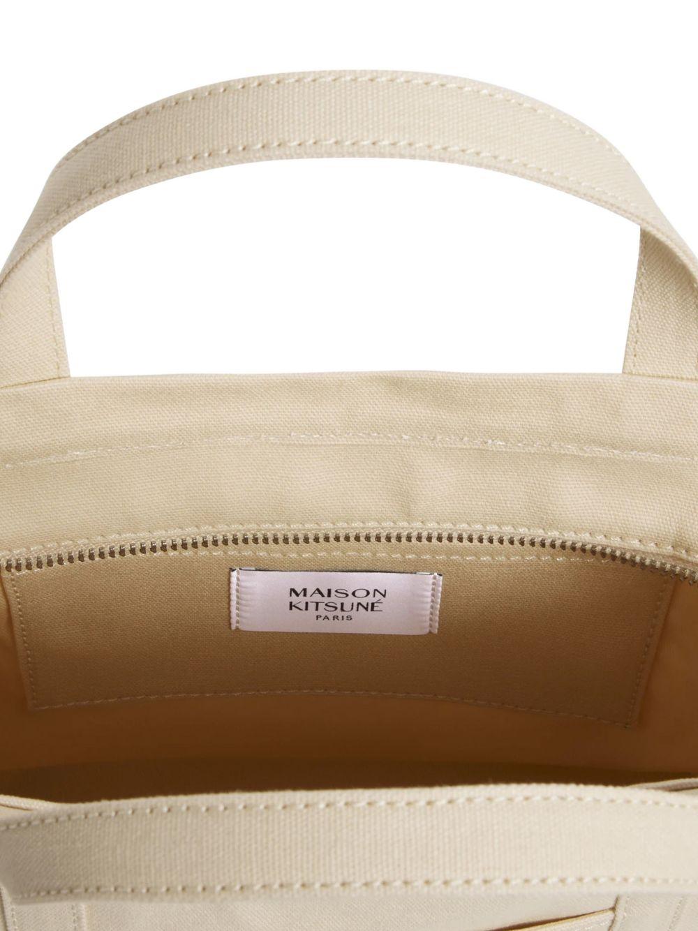 MAISON KITSUNE Borsa a mano con icona design ricamato beige chiaro