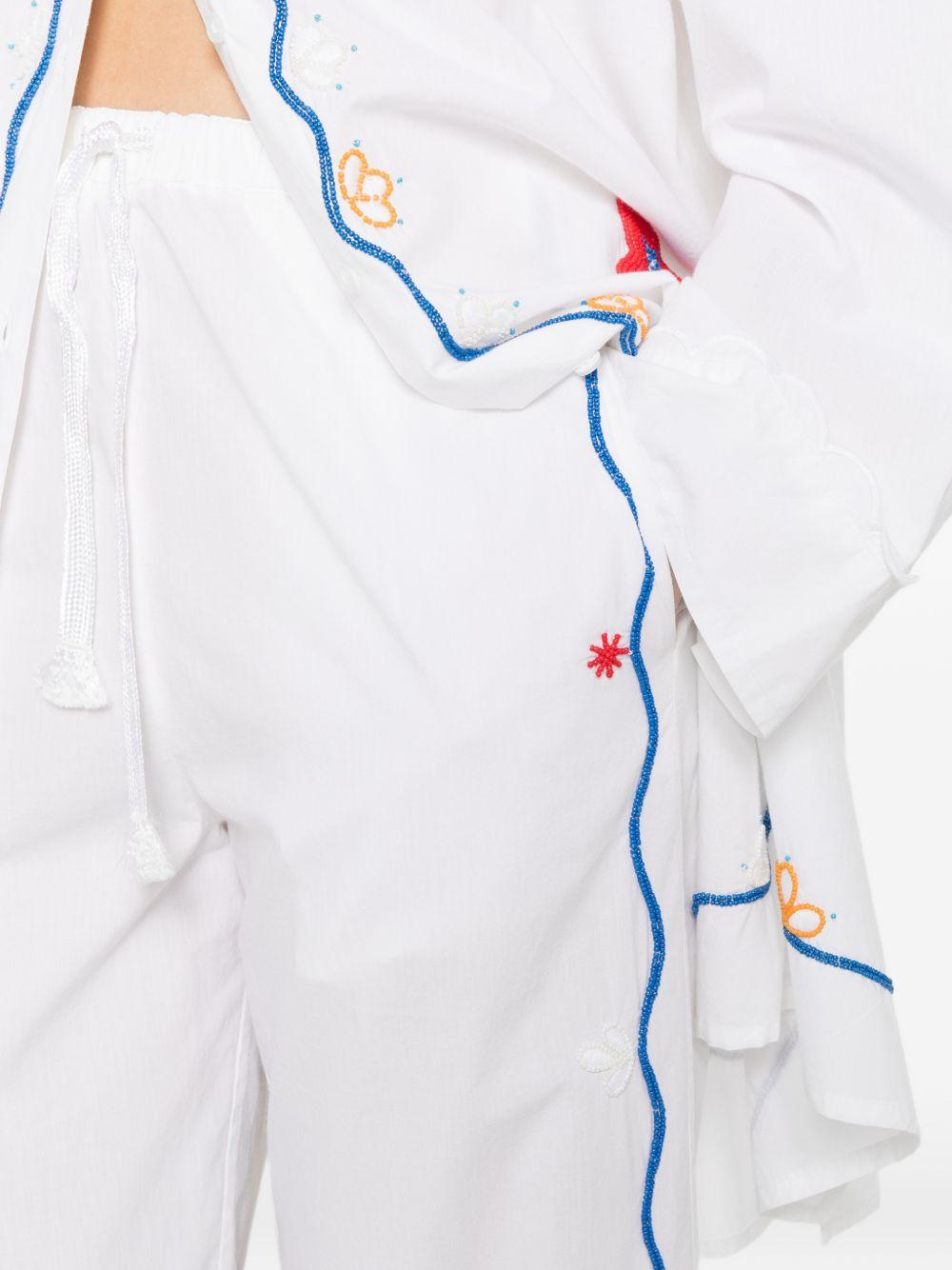 FORTE FORTE Pantaloni in cotone bianco con ricami floreali colorati