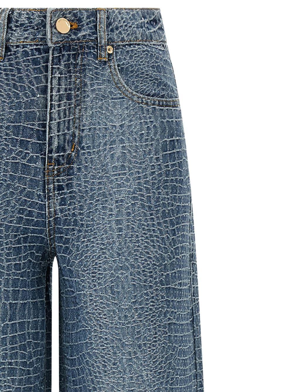 SELF PORTRAIT Jeans wide-leg con effetto cocco