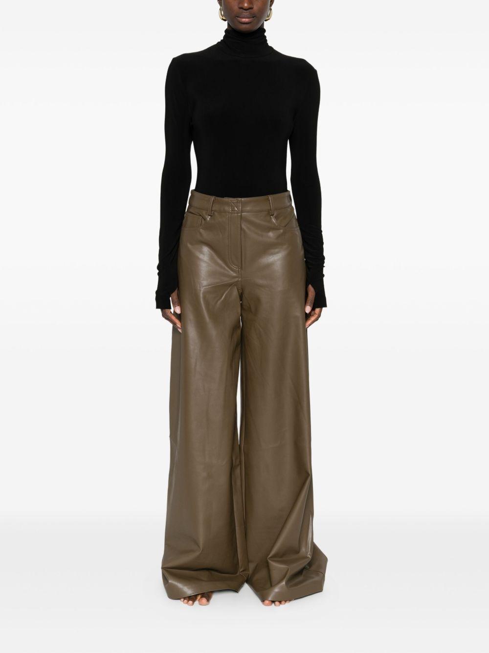 NORMA KAMALI Body nero a collo alto